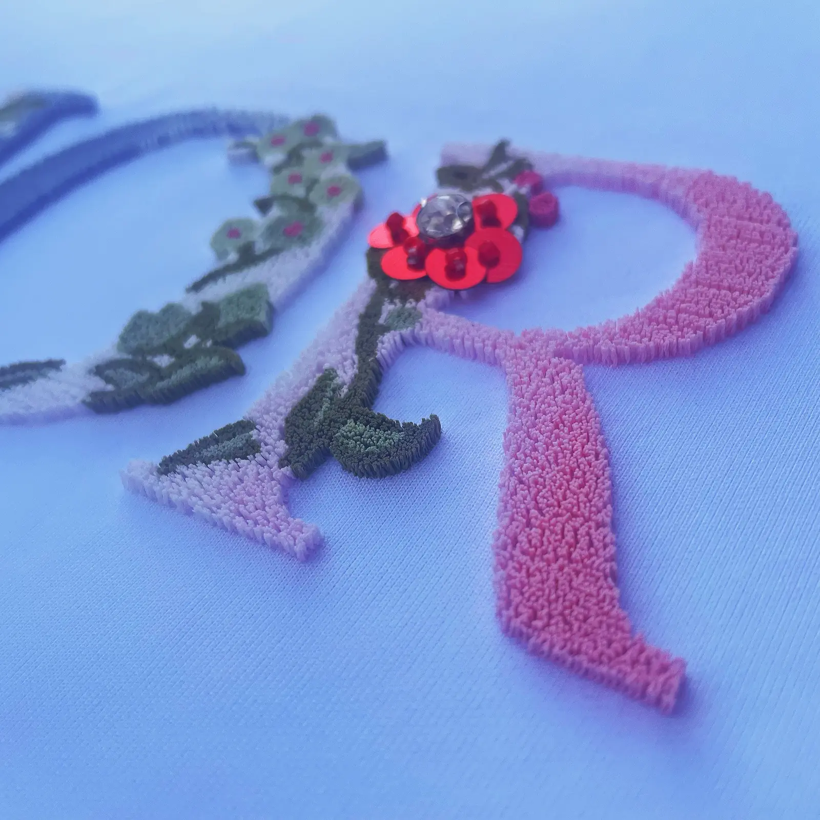 Custom toothbrush embroidery floral logo patch with hand-beaded detail 3