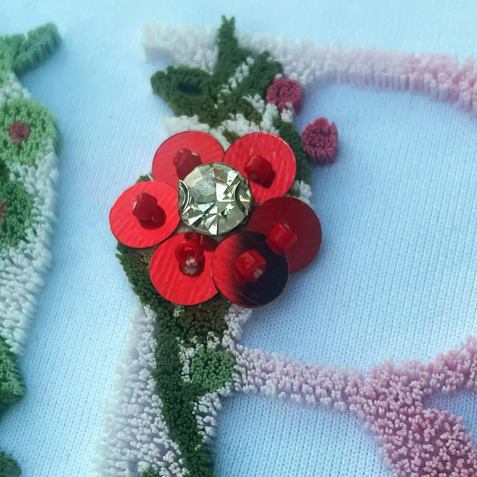 Custom toothbrush embroidery floral logo patch with hand-beaded detail 4