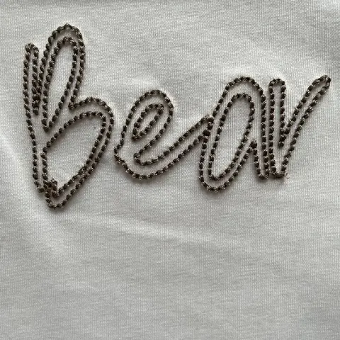 English-letter hollow 3D embroidery casual apparel with arch-bridge embroidery